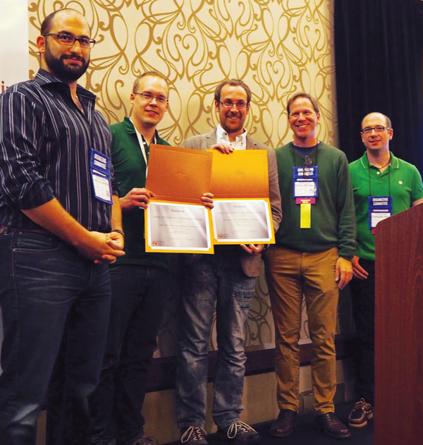 Some of the 2016 Internet Defense Prize winners: second from the left is Thomas Pöppelmann; Peter Schwabe is standing next to him (Alkim and Ducas not pictured). Source: USENIX. 