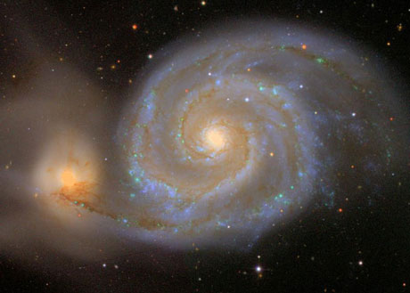 Figure 1: The famous Whirlpool Galaxy is one of the many objects in the SDSS database. SDSS acts as a well-documented benchmark for scientific database management. (Picture: The Sloan Digital Sky Survey.)