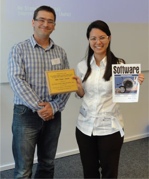 Anthony Cleve (left), ERCIM fellow and workshop co-organiser, and Lile Hattori, first author of the award-winning paper. 