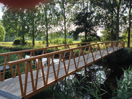 This footbridge (Nederwetten, The Netherlands) is made of more steel than strictly necessary to assure its quality. Software engineers must also consciously employ redundancy to ensure quality.