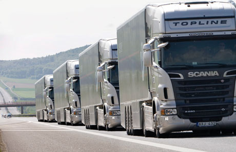 Figure 1: In the case of truck platooning, an analysis has to be carried out at the platoon level to identify principles for the safety of the SoS, and then these principles have to be translated to safety goals and requirements on the individual trucks. 