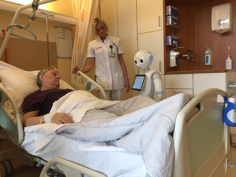 Figure 1: Using the Pepper as interview robot, self-reported patient outcomes can be collected autonomously, reliably, and efficiently at the Vlietland hospital. Source: RTV Rijnmond.