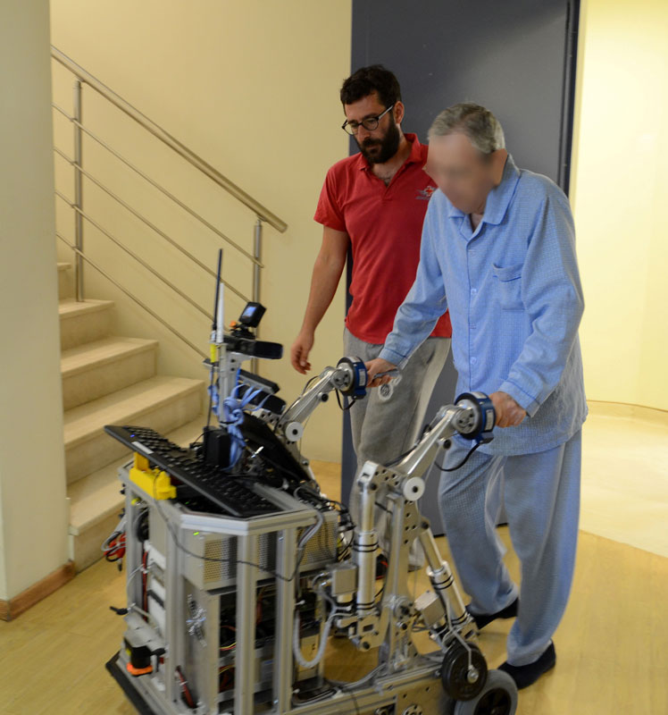 Figure 1: User navigating interaction during MOBOT rollator evaluation.