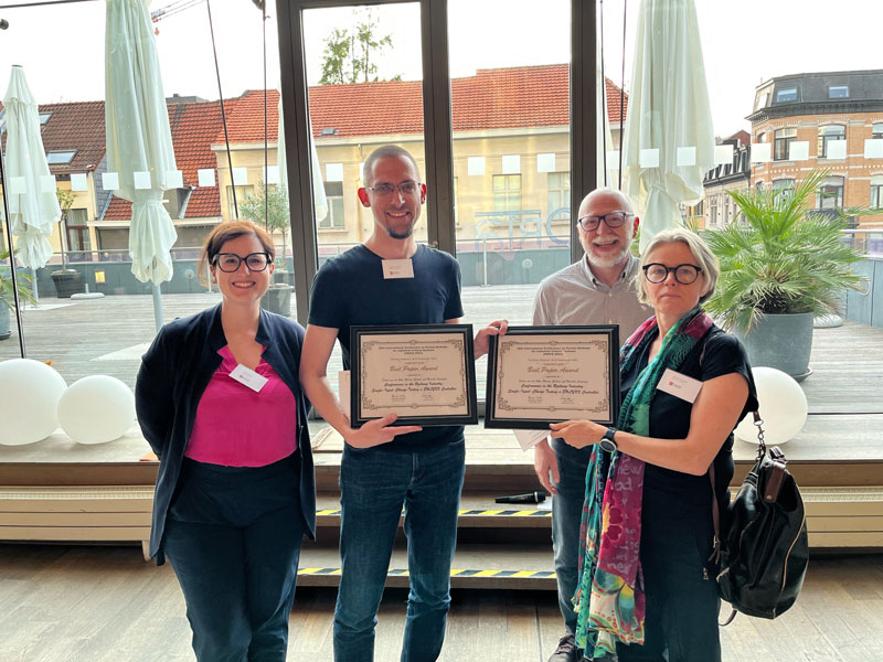 Djurre van der Wal and Mariëlle Stoelinga receive the FMICS 2023 Best Paper Award from the PC chairs Laura Titolo and Alessandro Cimatti.