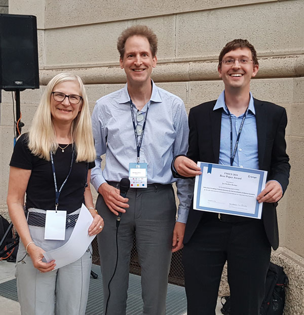 Figure 2: Jan Steffen Becker received the FMICS 2024 Best Paper Award from the PC chairs Anne Haxthausen and Wendelin Serwe.