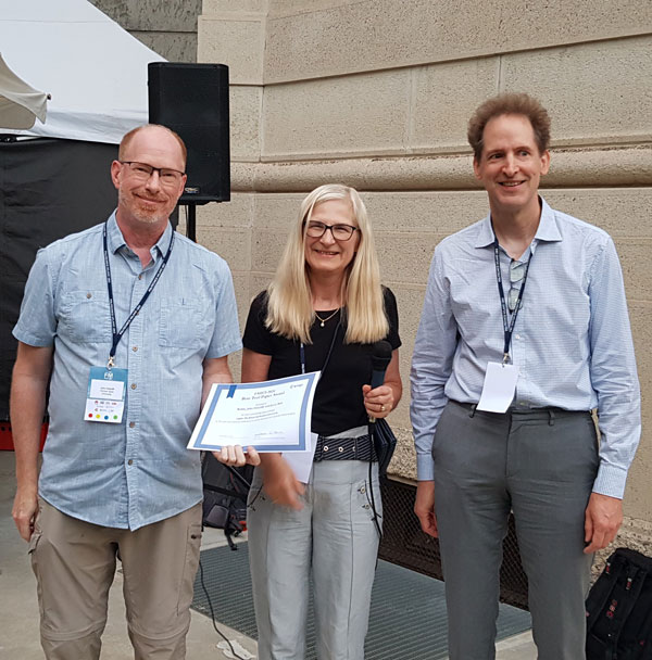 igure 3: John Hatcliff received the FMICS 2024 Best Tool Paper Award from the PC chairs Anne Haxthausen and Wendelin Serwe.