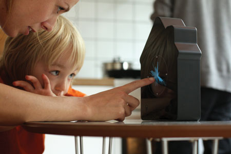 The ‘Energy Aware Clock’ gives intuitive feedback on the electricity load of the house.