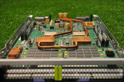 Figure 2: Prototype of water-cooled blade with two high-performance micro-channel liquid coolers that remove heat from the processors.