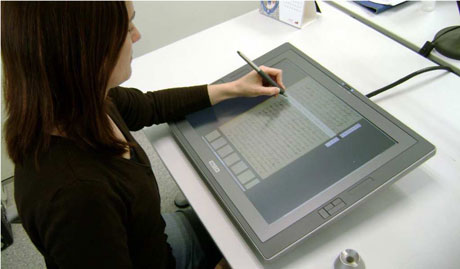 Figure 1: Using the MM-CATTI system with a touch-screen. 