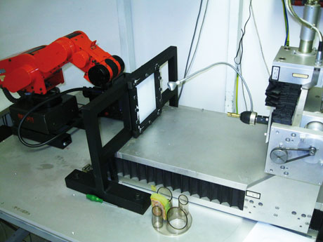 Figure 1: Set-up with small robot and milling machine