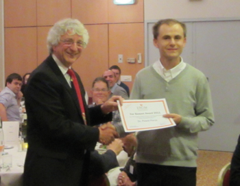 ERCIM president Keith Jeffery (left) presents the 2012 Cor Baayen award to Paweł Parys.