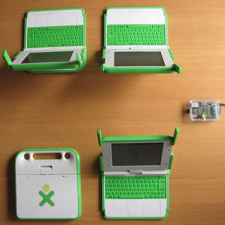 Figure 1: an example of ERS deployment that could be in a school. The four XO laptops are Contributors using the RaspberryPi as a Bridge to asynchronously exchange data with another school.